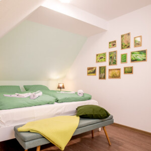 Das Elternschlafzimmer in der Ferienwohung P7 lädt zum Entspannen und genießen ein. Schlafzimmer der Ferienwohnung P7 in der Residenz Kormoran